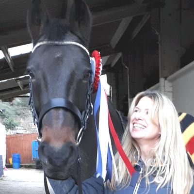 Horse and rider with online dressage rosette